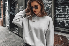 Woman in grey sweatshirt outdoors mockup Product Image 1