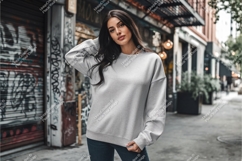 Woman in grey sweatshirt in city mockup Product Image 1