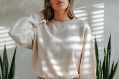 Woman in beige sweatshirt indoors mockup Product Image 1