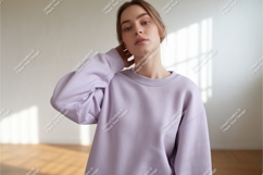 Woman in lilac sweatshirt posing mockup Product Image 1