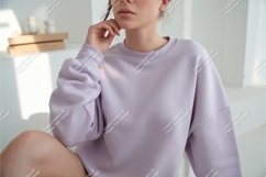 Woman in lilac sweatshirt indoors mockup Product Image 1