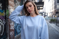 Woman in blue sweatshirt poses mockup Product Image 1
