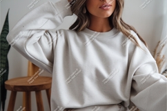 Woman poses in beige sweatshirt mockup Product Image 1