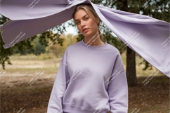 Woman in lavender sweatshirt mockup Product Image 1