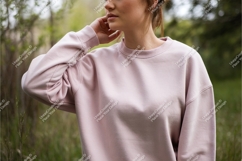Woman in pink sweatshirt in park mockup Product Image 1