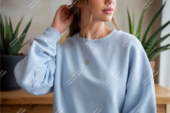 Woman in blue sweatshirt mockup Product Image 1