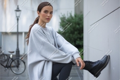 Woman in gray sweatshirt sitting mockup Product Image 1