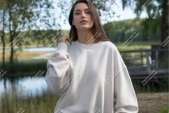 Woman in white sweatshirt outside mockup Product Image 1