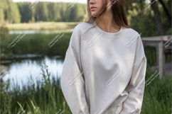 Woman in white sweatshirt near lake mockup Product Image 1
