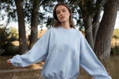 Woman in blue sweatshirt mockup Product Image 1