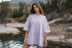 Woman in purple tshirt poses mockup Product Image 1