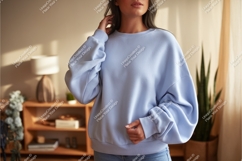 Woman in blue sweatshirt indoors mockup Product Image 1