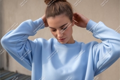 Woman in blue sweatshirt mockup Product Image 1