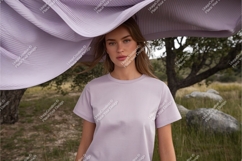 Woman in lilac tshirt outdoors mockup Product Image 1