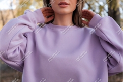 Woman in purple sweatshirt poses mockup Product Image 1