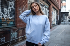 Woman in blue sweater outdoors mockup Product Image 1