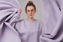 Woman in lilac sweatshirt mockup Product Image 1