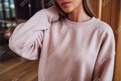 Woman wearing pink sweatshirt apparel clothing Product Image 1