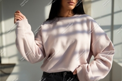 Woman wearing light pink sweatshirt clothing fashion Product Image 1