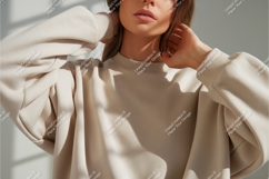 Woman wearing beige sweatshirt clothing fashion Product Image 1