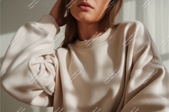 Woman wearing cream crewneck sweatshirt casual Product Image 1