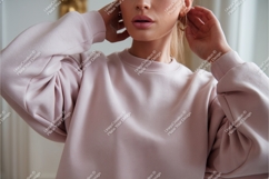 Woman wearing pink sweatshirt clothing fashion Product Image 1