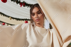 Woman wearing cream sweatshirt fashion mockup Product Image 1