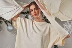 Woman wearing cream t shirt mockup image Product Image 1