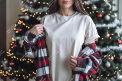 Woman wearing plain shirt with plaid jacket near Christmas Product Image 1