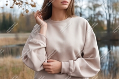 Woman wearing beige sweatshirt outdoors nature Product Image 1