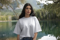 Woman wearing grey t-shirt outdoors Product Image 1
