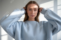 Woman wearing light blue sweatshirt casual Product Image 1