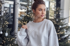 Woman wearing grey sweatshirt mockup apparel Product Image 1