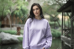 Woman wearing lavender sweatshirt outdoors nature Product Image 1