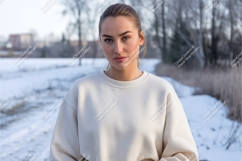 Woman wearing cream sweatshirt outdoors winter Product Image 1