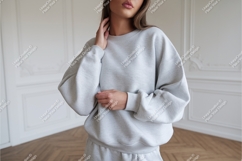 Woman wearing light gray sweatshirt clothing fashion Product Image 1