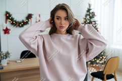 Woman wearing pink sweatshirt casual fashion Product Image 1