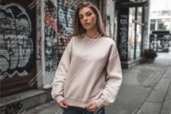 Woman wearing beige sweatshirt urban street image Product Image 1