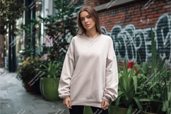 Woman wearing beige sweatshirt mockup fashion Product Image 1