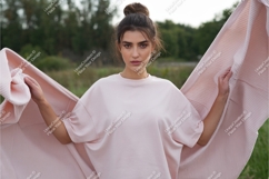 Woman wearing pink sweatshirt outdoors nature Product Image 1