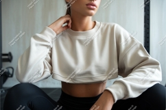 Woman wearing cream cropped sweatshirt black Product Image 1