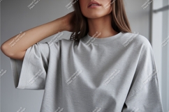 Woman wearing grey t shirt clothing Product Image 1