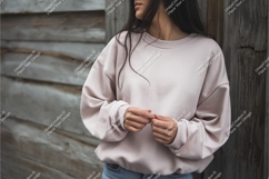 Woman wearing light pink sweatshirt mockup apparel Product Image 1