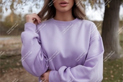 Woman wearing lavender sweatshirt outdoors apparel Product Image 1