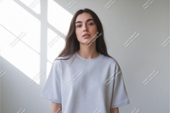 Woman wearing light grey t shirt image Product Image 1