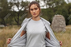 Woman wearing grey t shirt and jacket image Product Image 1