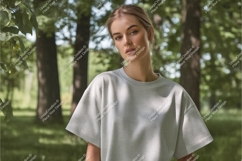 Woman wearing light grey sweatshirt outdoors nature Product Image 1