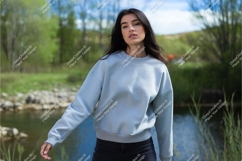 Woman wearing light blue sweatshirt outdoors image Product Image 1