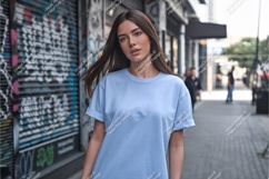 Young woman wearing blue t-shirt mockup street Product Image 1