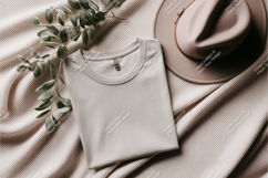 Folded shirt with hat mockup Product Image 1
